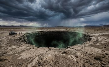 A massive, terrifying deep black sinkhole known as the Well of Barhout or Well of Hell in the desert of Yemen.