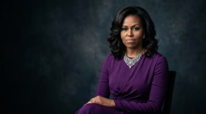 A formal, elegant portrait of former First Lady Michelle Obama in a purple dress.